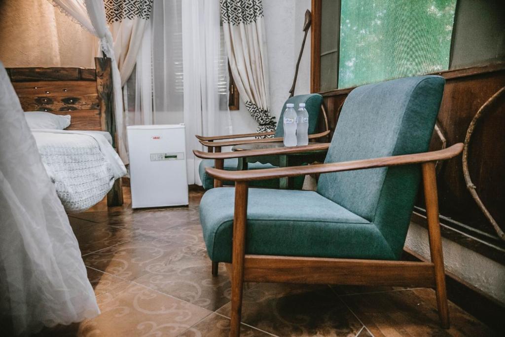 Postel nebo postele na pokoji v ubytování Selous Kinga Lodge