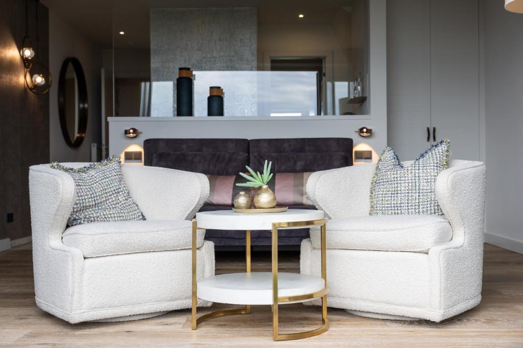 Posezení v ubytování Hotel STRAND am Königshafen