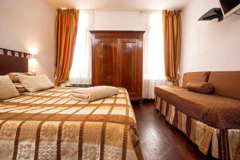 Voodi või voodid majutusasutuse Albergo Marin toas