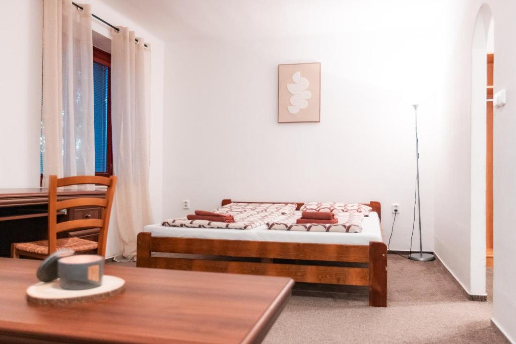 Postel nebo postele na pokoji v ubytování Hotel Rozkoš