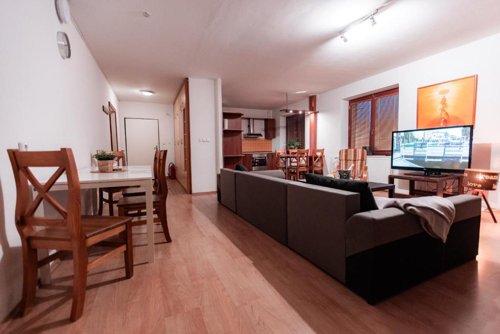 TV a/nebo společenská místnost v ubytování Hotel Rozkoš