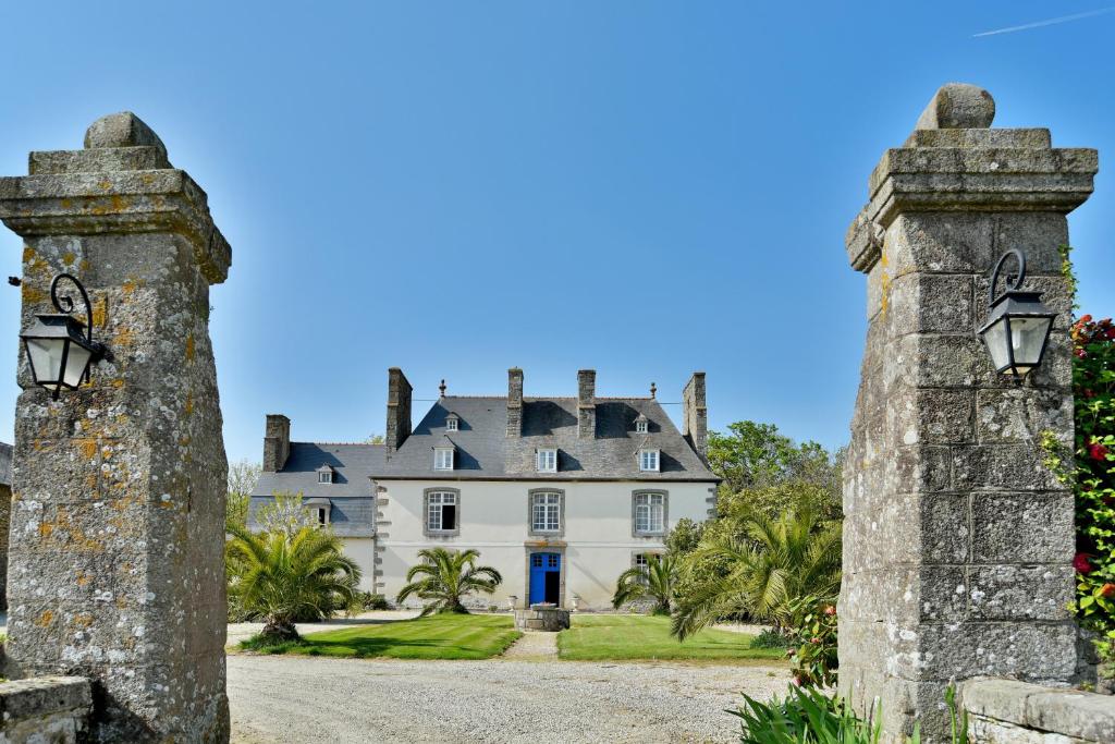 an old castle with two stone towers at Domaine de Launay blot in Baguer-Morvan
