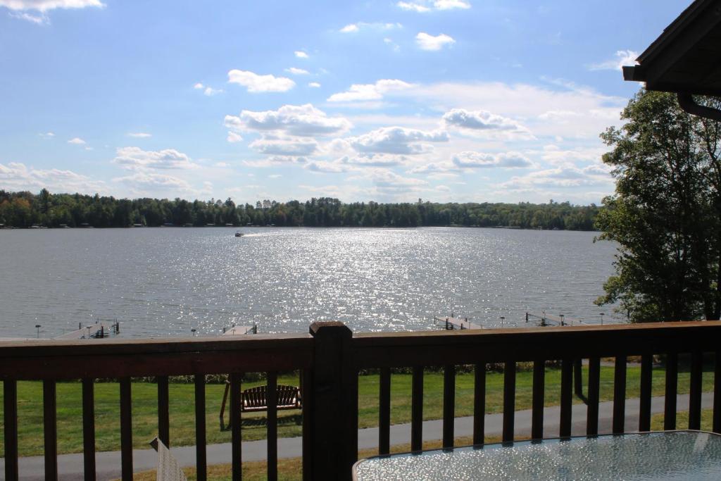 a view of a large lake from a balcony at 2 Bedroom Condo at Wild Eagle Lodge, #212 in Eagle River
