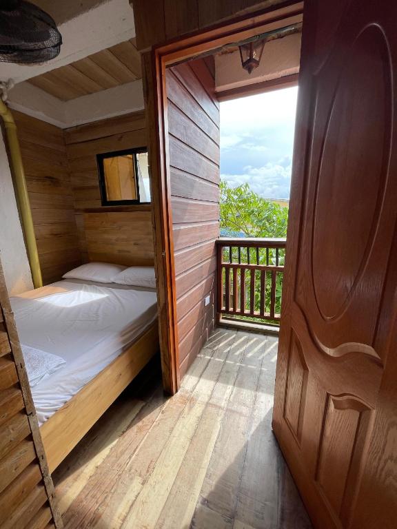 Postel nebo postele na pokoji v ubytování Petra Hotel