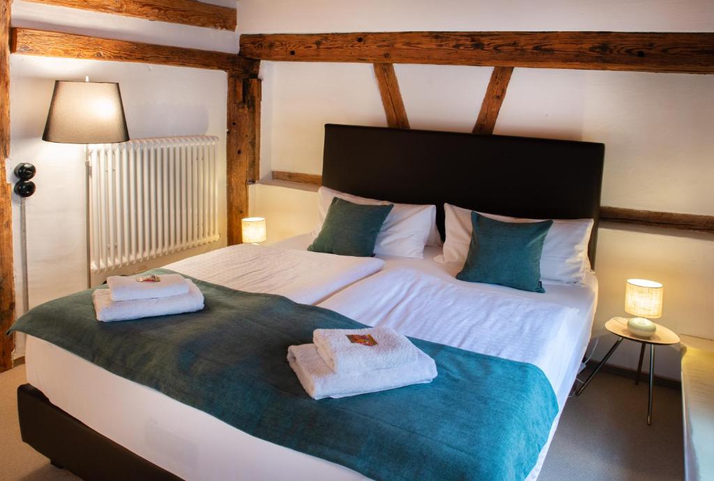 Postel nebo postele na pokoji v ubytování Haus im Zitronengässele