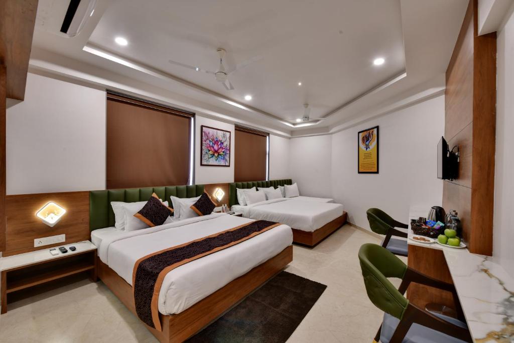 Rúm í herbergi á Soil to Soul Trinity Hotel - A Boutique Stay