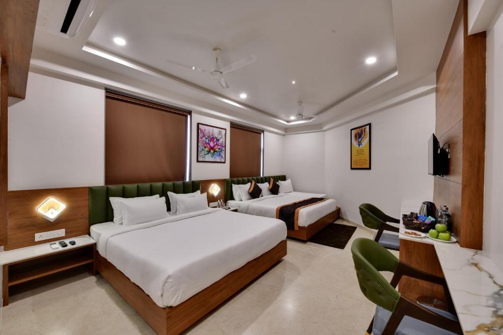 Rúm í herbergi á Soil to Soul Trinity Hotel - A Boutique Stay