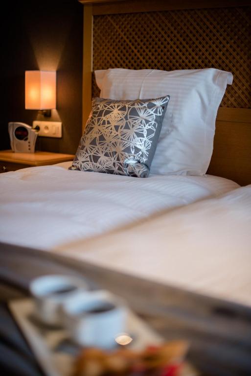 Postel nebo postele na pokoji v ubytování B&B De Bergvallei