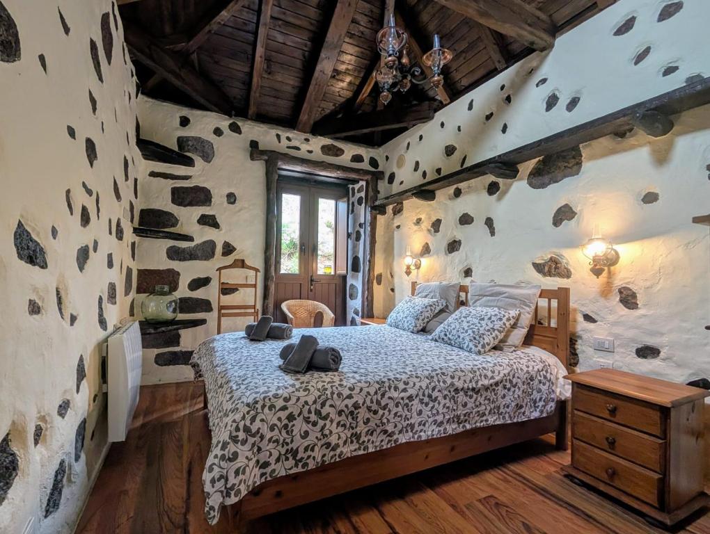 Postel nebo postele na pokoji v ubytování CHC - Casa Rural del Herrero