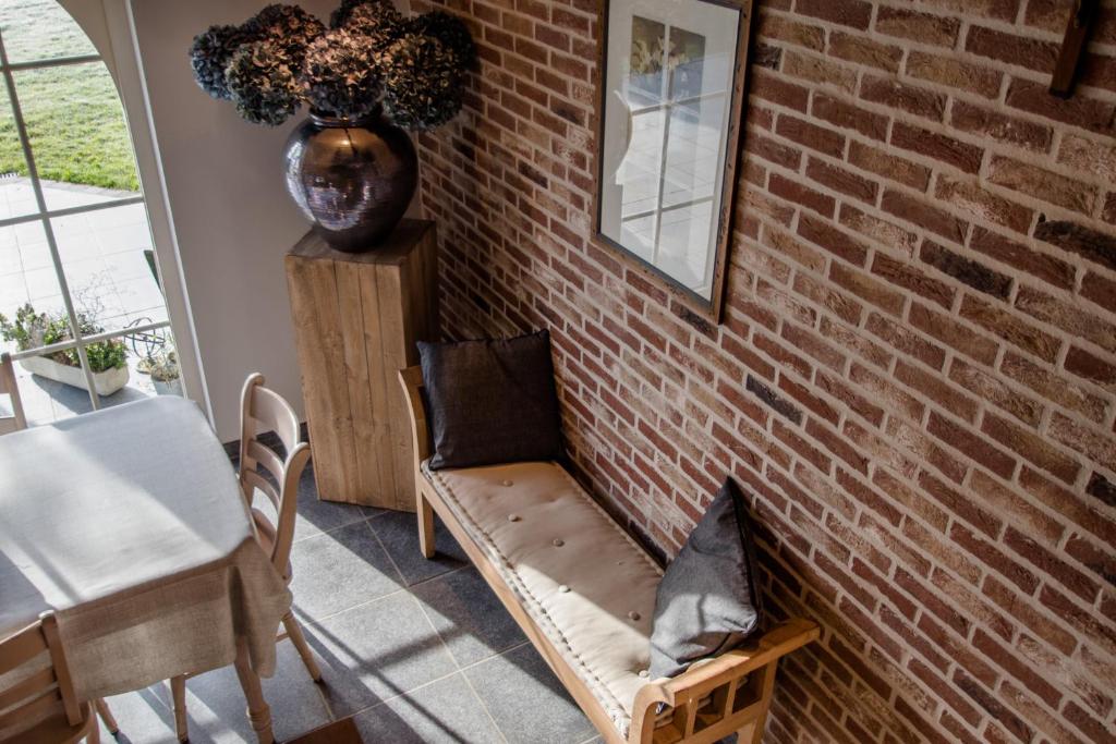 Posezení v ubytování B&B De Bergvallei