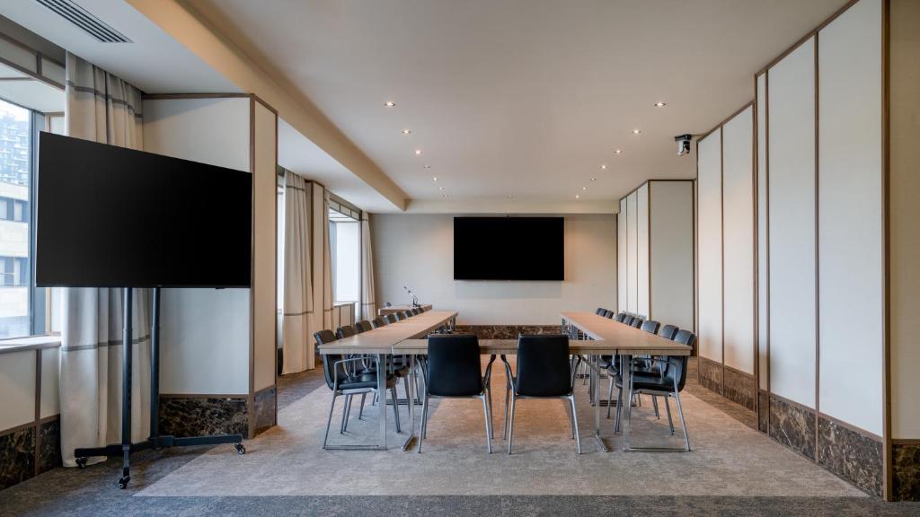 TV a/nebo společenská místnost v ubytování AC Hotel Milano by Marriott