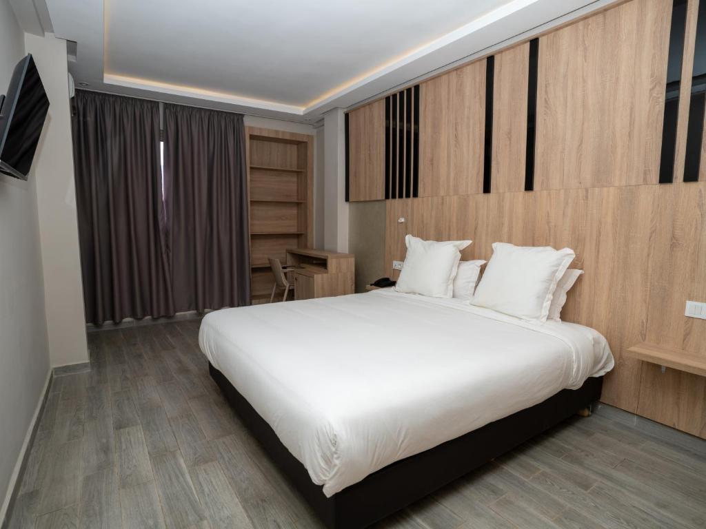 Postel nebo postele na pokoji v ubytování HOTEL CAFE PALAIS SALAM , Beni Mellal
