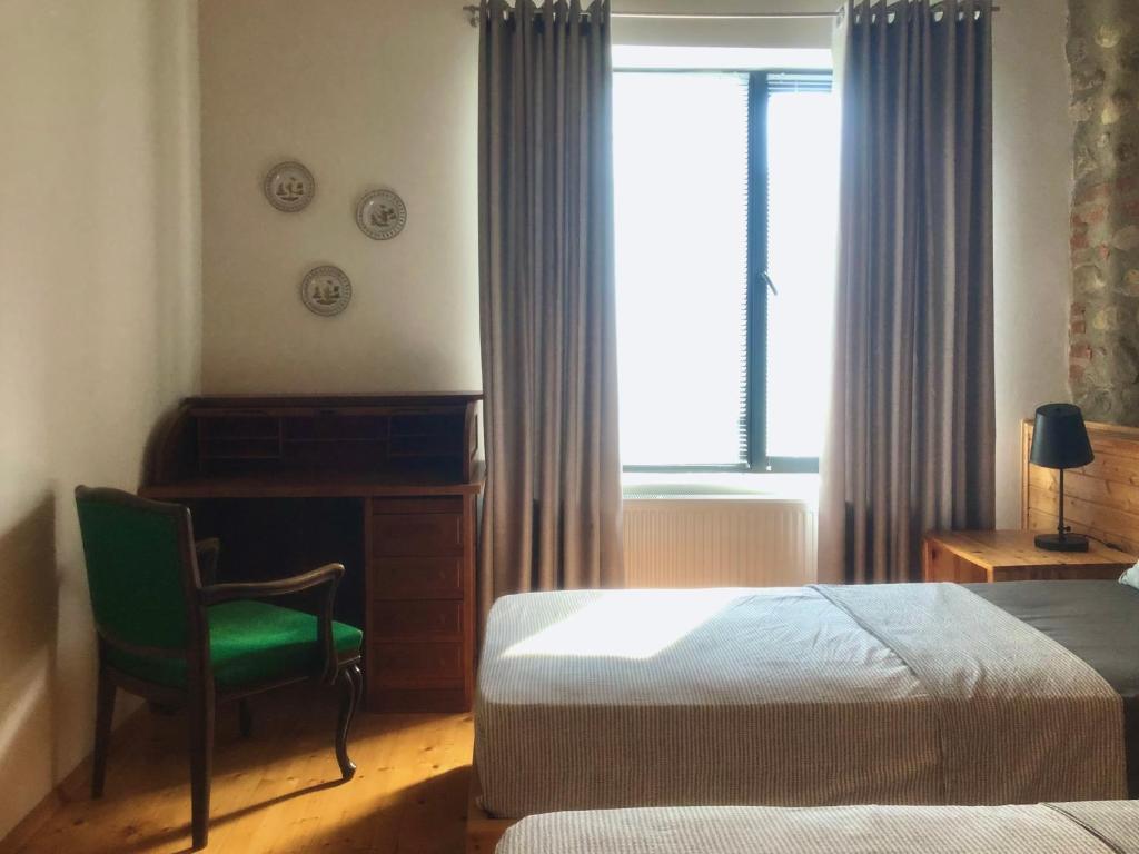 Postel nebo postele na pokoji v ubytování Lokokina Guesthouse