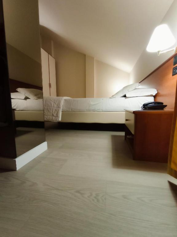 Posteľ alebo postele v izbe v ubytovaní Hotel Motel Europa