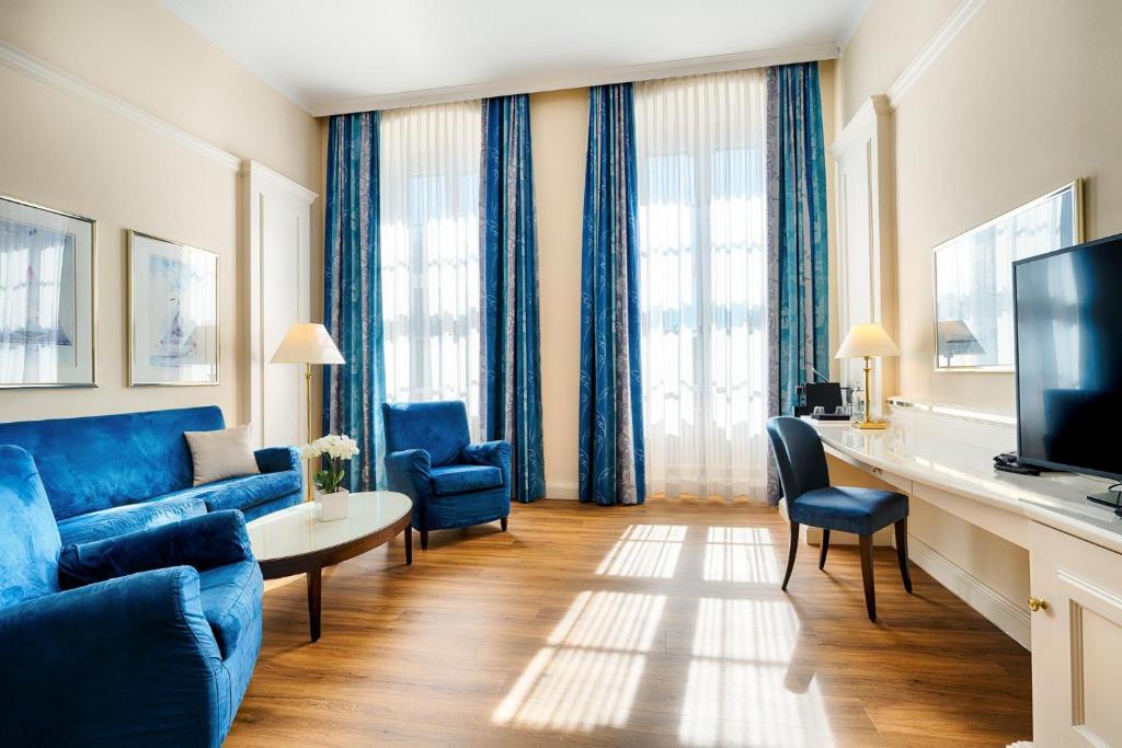 TV a/nebo společenská místnost v ubytování Welcome Hotel Residenzschloss Bamberg