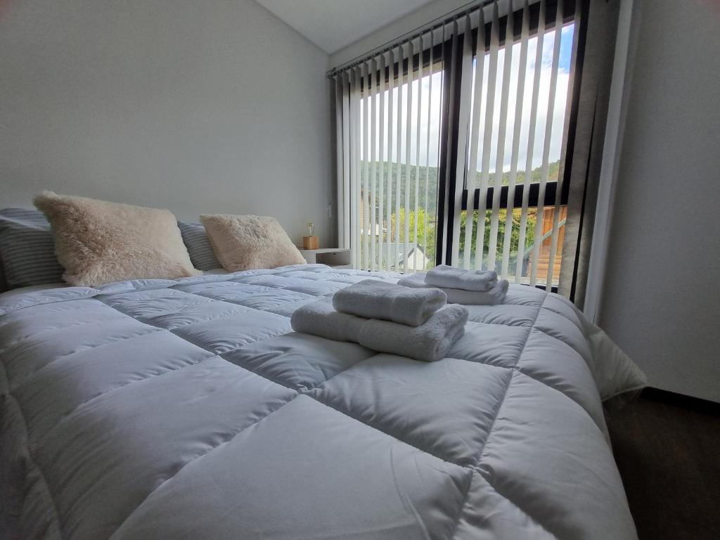 En eller flere senge i et værelse på Ruka 10 - Andarlibre