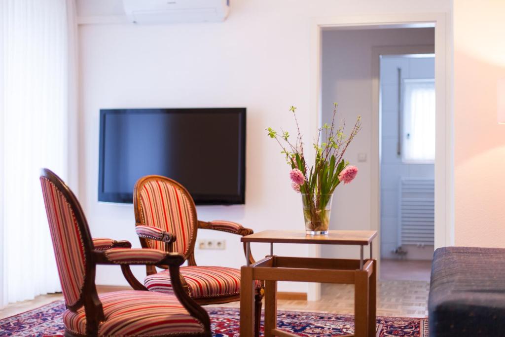 TV a/nebo společenská místnost v ubytování Hotel garni Schacherer