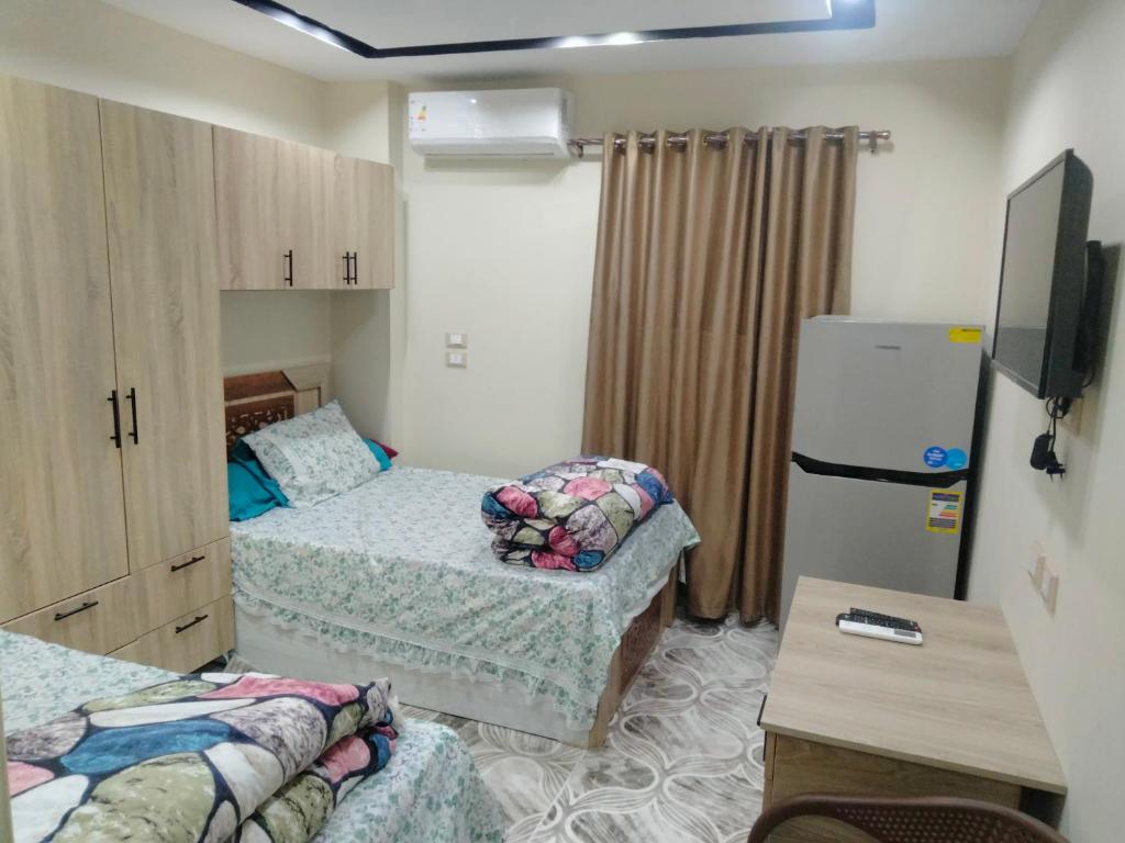 Postel nebo postele na pokoji v ubytování EL Hosary House