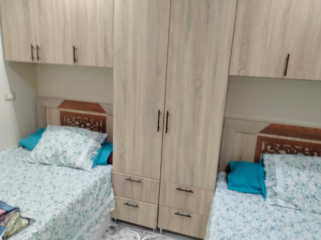 Postel nebo postele na pokoji v ubytování EL Hosary House