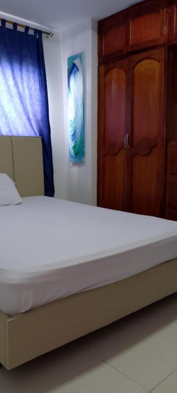 Postel nebo postele na pokoji v ubytování Casa Mangle