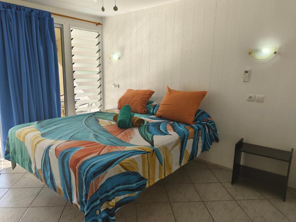 Postel nebo postele na pokoji v ubytování Fare Ara Location Huahine