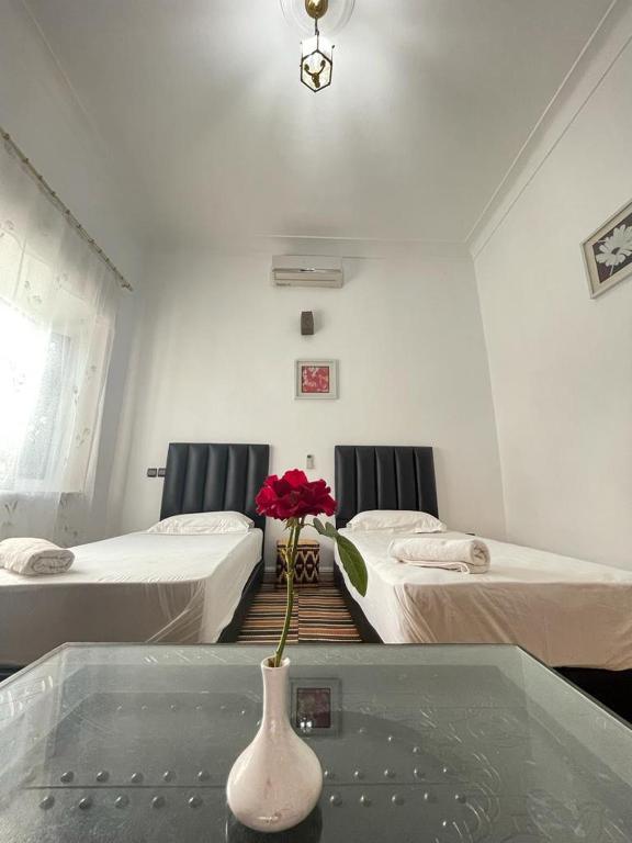 Postel nebo postele na pokoji v ubytování Riad Oussari