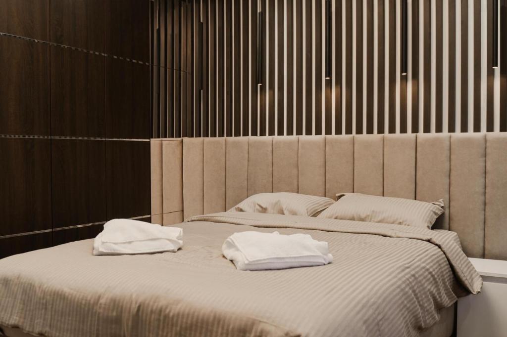 Ένα ή περισσότερα κρεβάτια σε δωμάτιο στο Apartmani "AS"