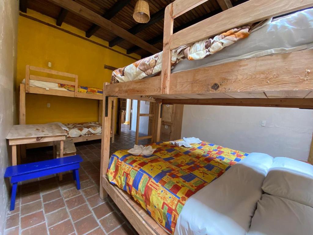 Postel nebo postele na pokoji v ubytování Rossco Hostel