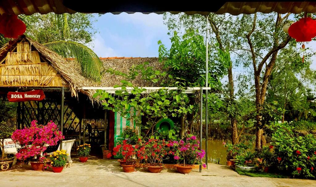 Zahrada ubytování BOSA Homestay - Mekong Riverside