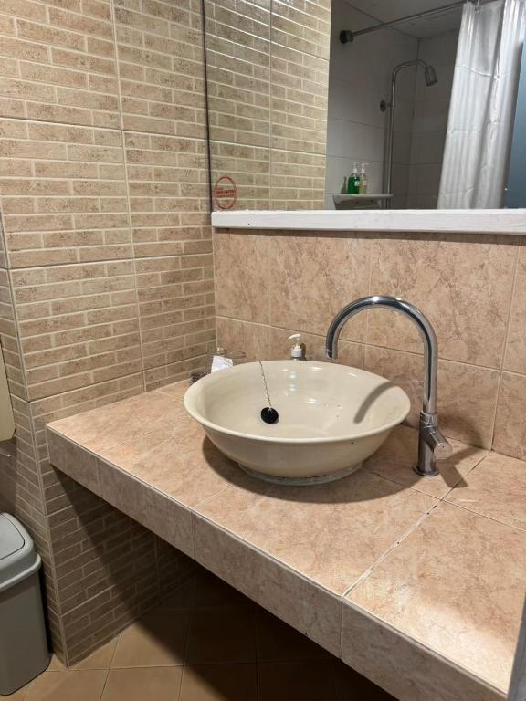 Koupelna v ubytování Sun Hotel