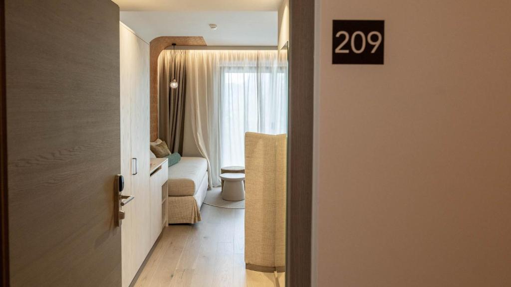 Postel nebo postele na pokoji v ubytování Hotel Gschwangut
