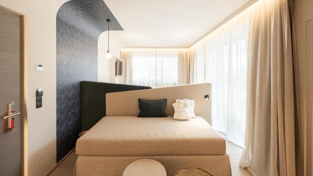Postel nebo postele na pokoji v ubytování Hotel Gschwangut