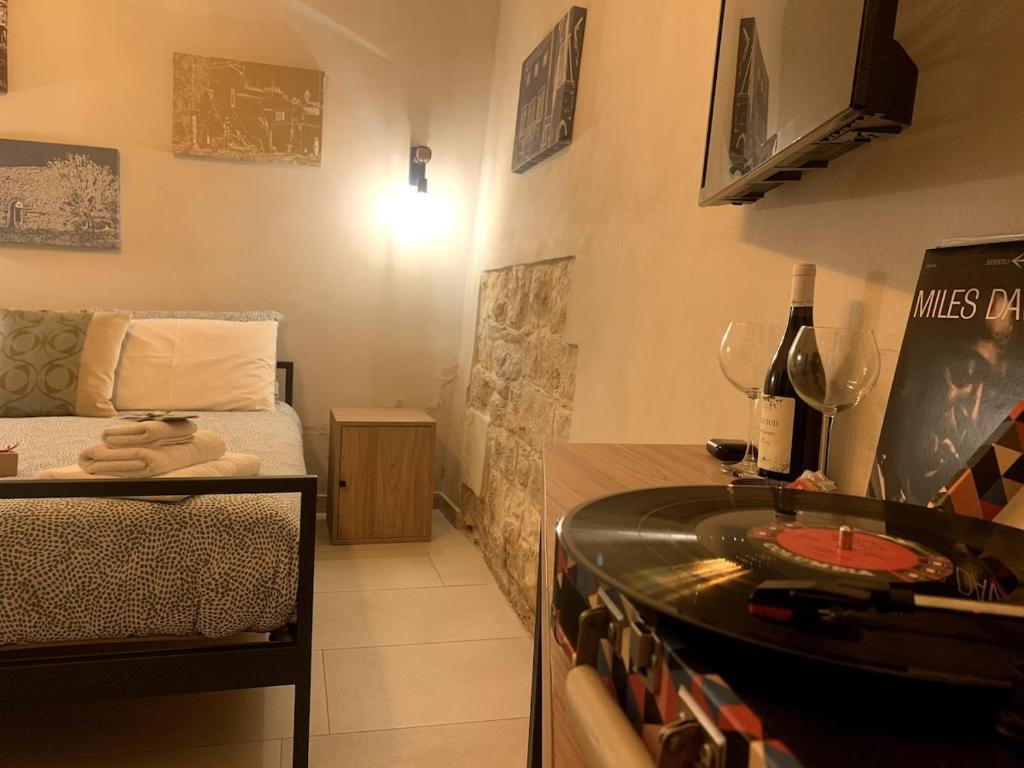 Postel nebo postele na pokoji v ubytování Locus Pendinelli Trani