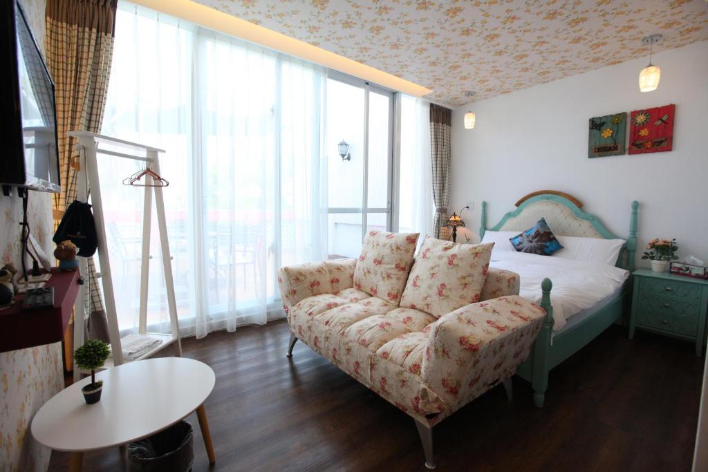 Postel nebo postele na pokoji v ubytování Qing Noise Villas