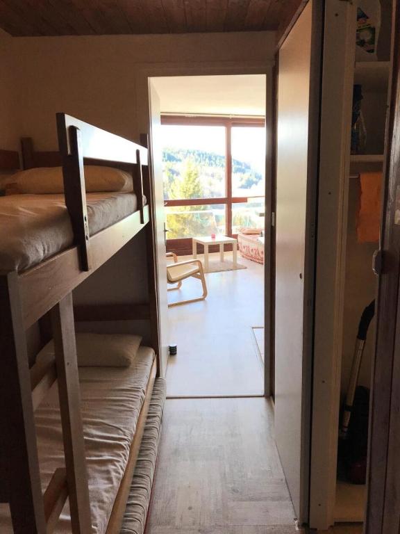 Posteľ alebo postele v izbe v ubytovaní Résidence Les Arolles - JOLIE STUDIO AUX PIEDS DES PISTES MAE-2644