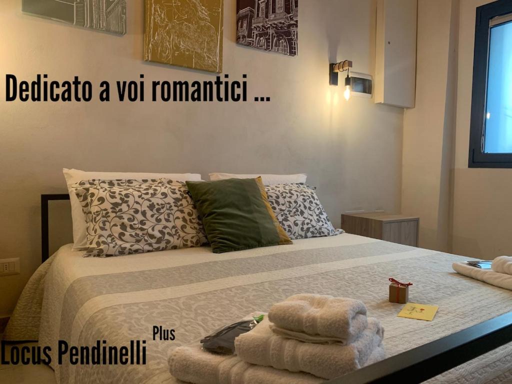 Postel nebo postele na pokoji v ubytování Locus Pendinelli Trani