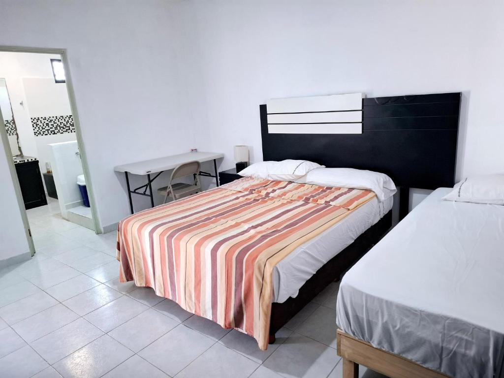 Postel nebo postele na pokoji v ubytování Samba rooms