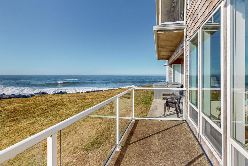 a balcony with a view of the ocean at Ocean Star in Depoe Bay