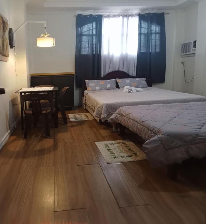 Postel nebo postele na pokoji v ubytování Leizel's Bed & Breakfast