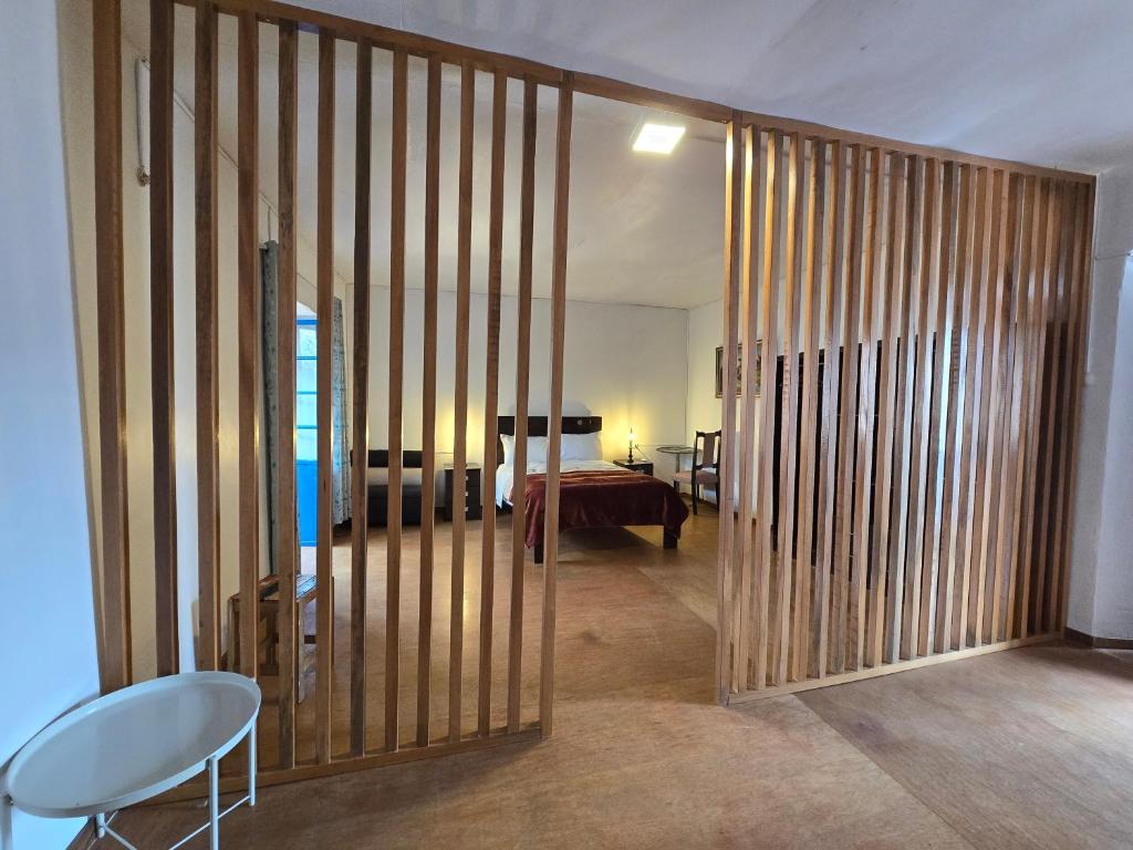 Postel nebo postele na pokoji v ubytování Barrio Inka B&B