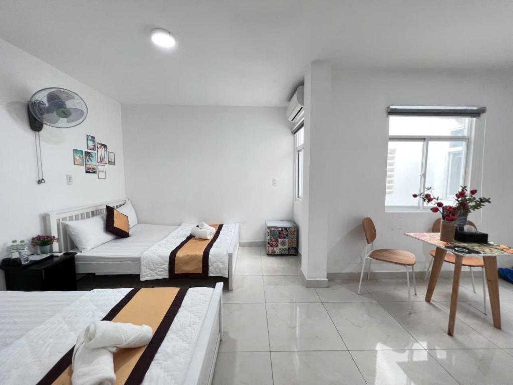 Postel nebo postele na pokoji v ubytování Hotel Đông Nhi