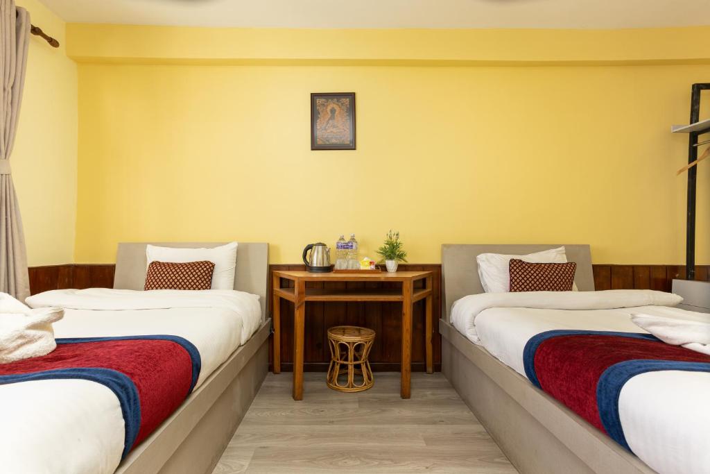Postel nebo postele na pokoji v ubytování Thamel Hotel & Spa