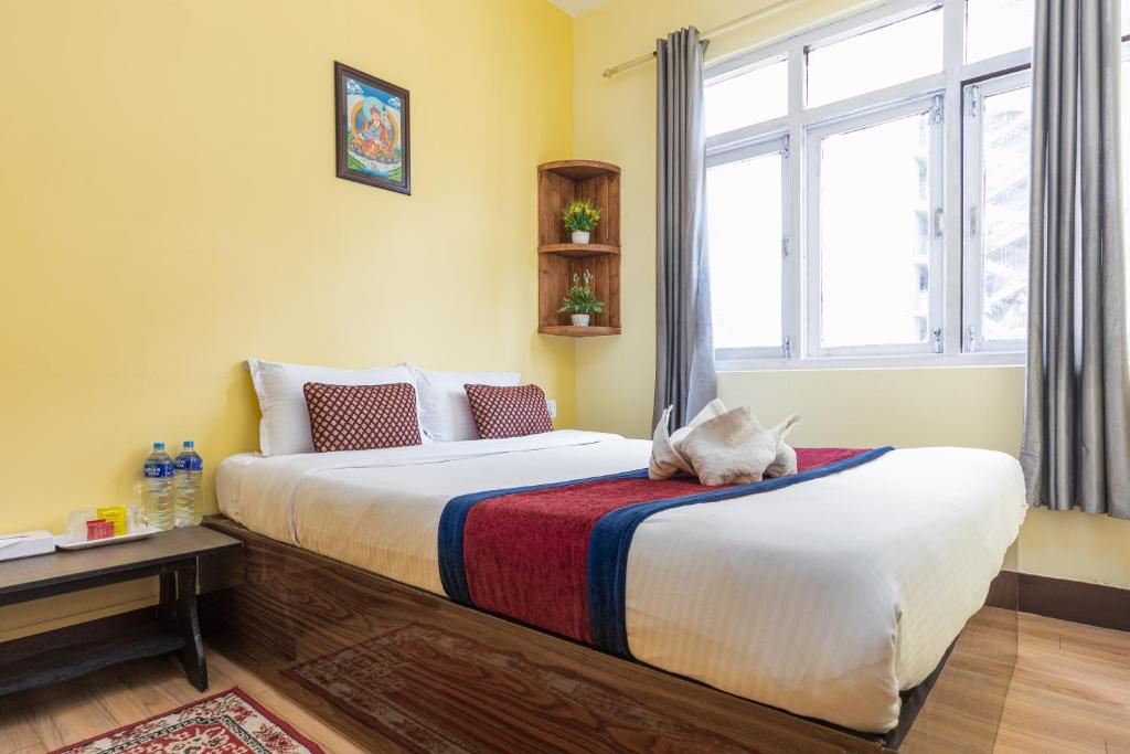 Postel nebo postele na pokoji v ubytování Thamel Hotel & Spa