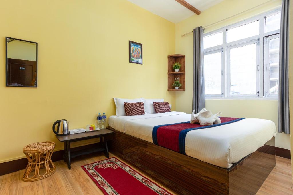 Postel nebo postele na pokoji v ubytování Thamel Hotel & Spa