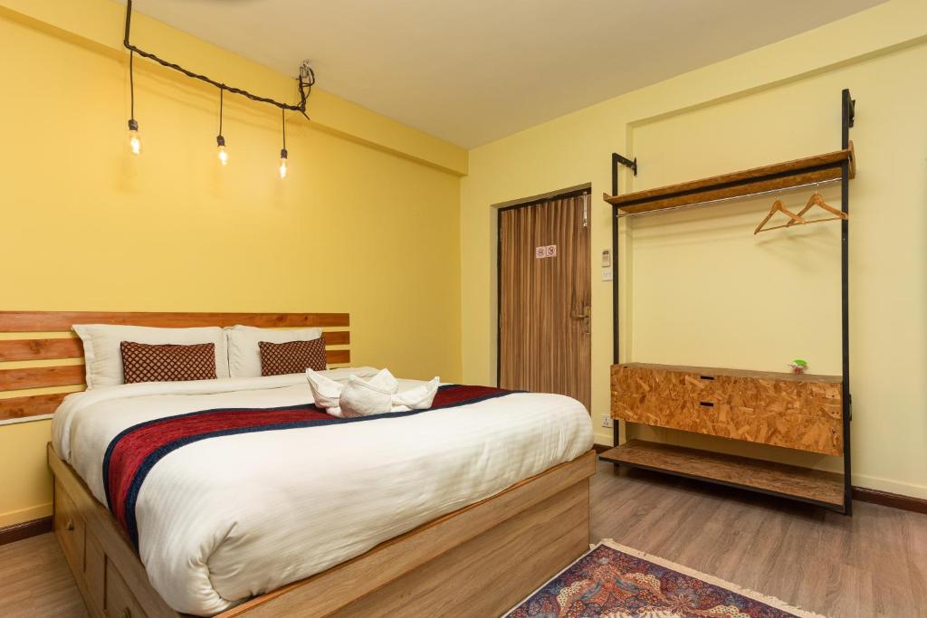 Postel nebo postele na pokoji v ubytování Thamel Hotel & Spa