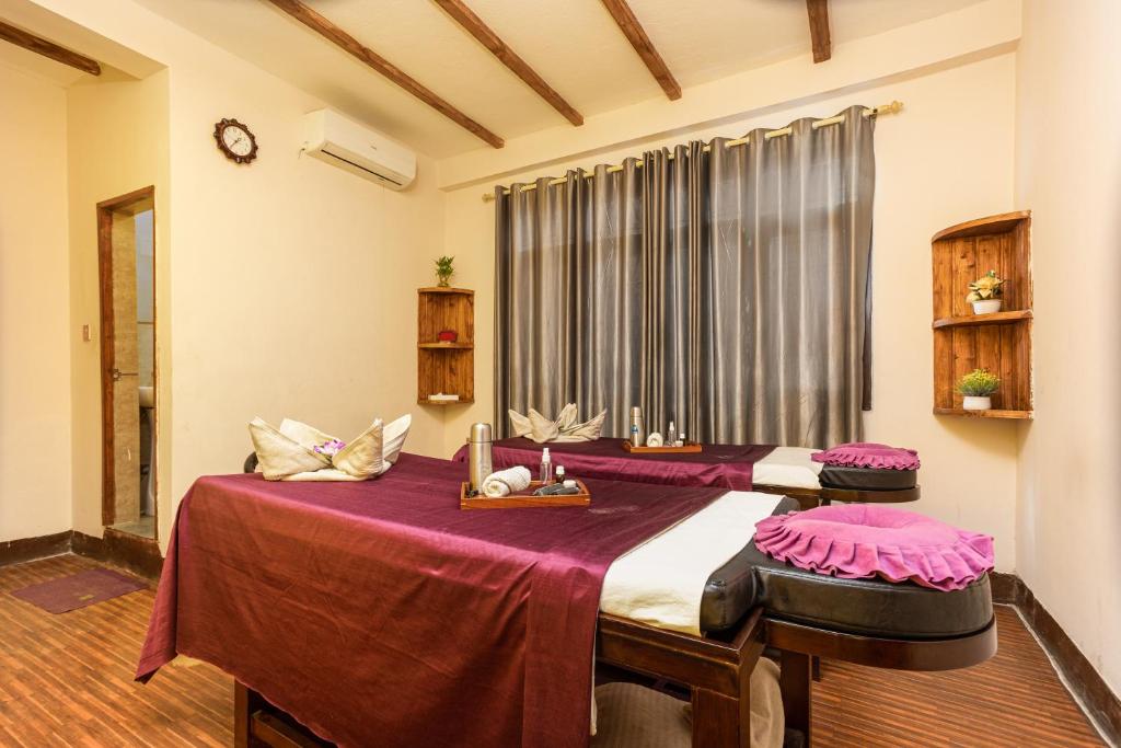 Postel nebo postele na pokoji v ubytování Thamel Hotel & Spa