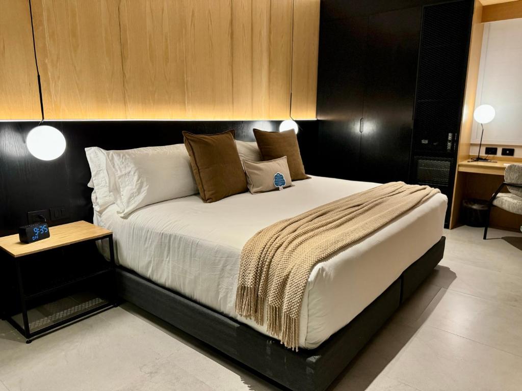 Postel nebo postele na pokoji v ubytování Hotel Aló Degollado