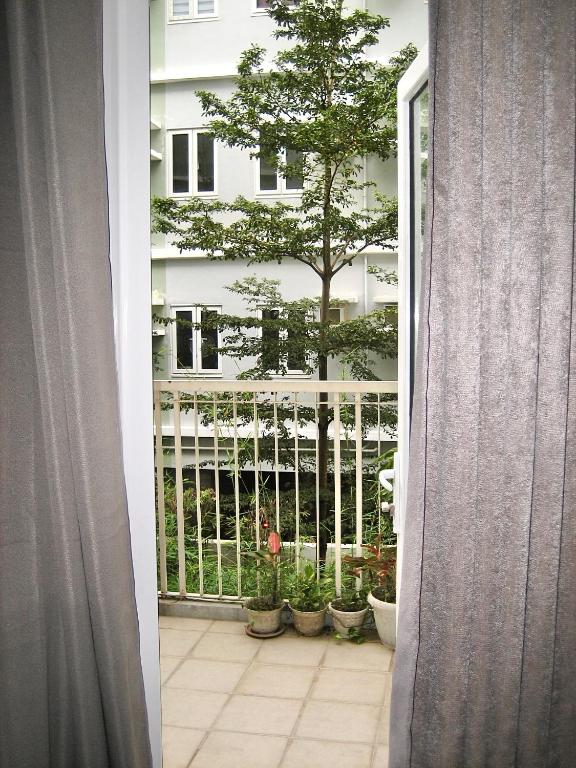 Balkón nebo terasa v ubytování 1BR at Trees Residences with Balcony