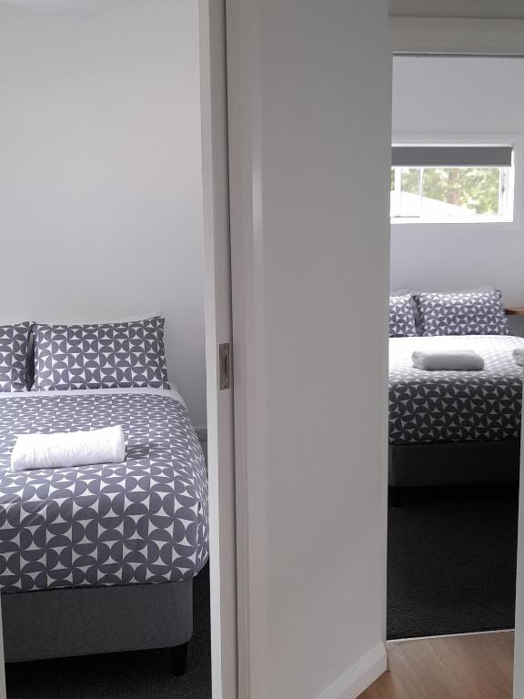 Postel nebo postele na pokoji v ubytování Myrtleford Holiday Park