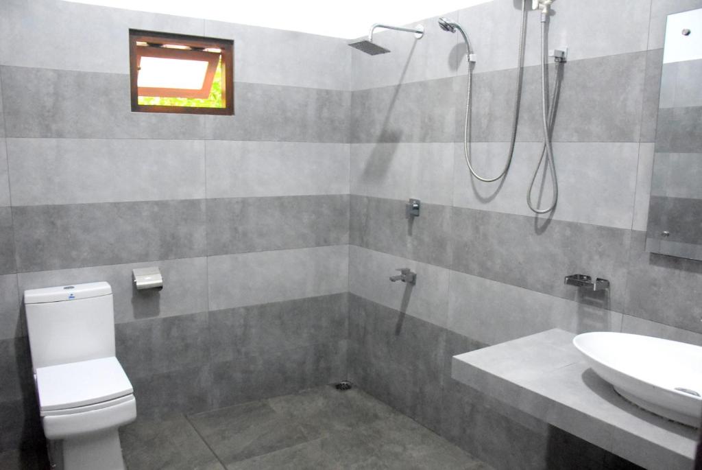 Koupelna v ubytování Kulassa Homes